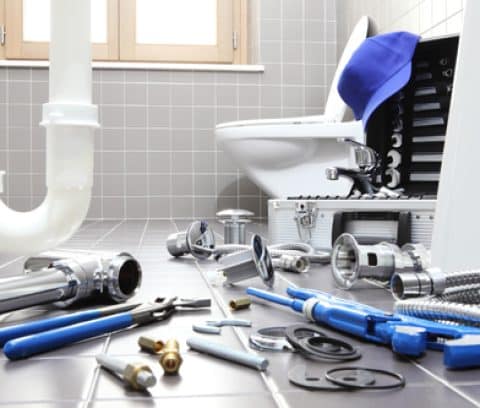 plumber tools and equipment in a bathroom, plumbing repair service, assemble and install concept